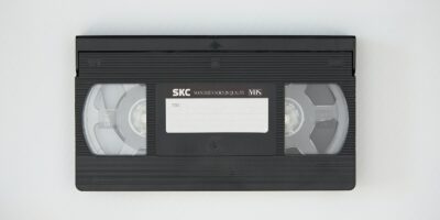 black cassette tape on white textile