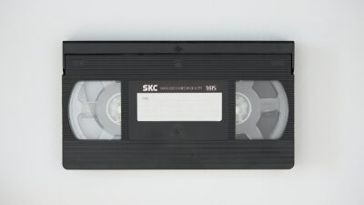 black cassette tape on white textile