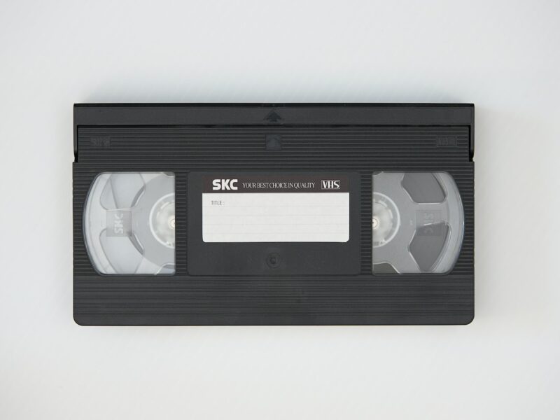 black cassette tape on white textile